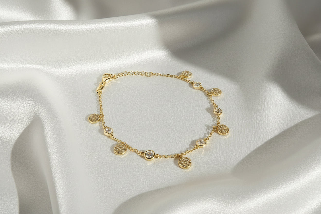 Braccialetto artigianale in argento galvanizzato oro con pendenti tondi con zirconi