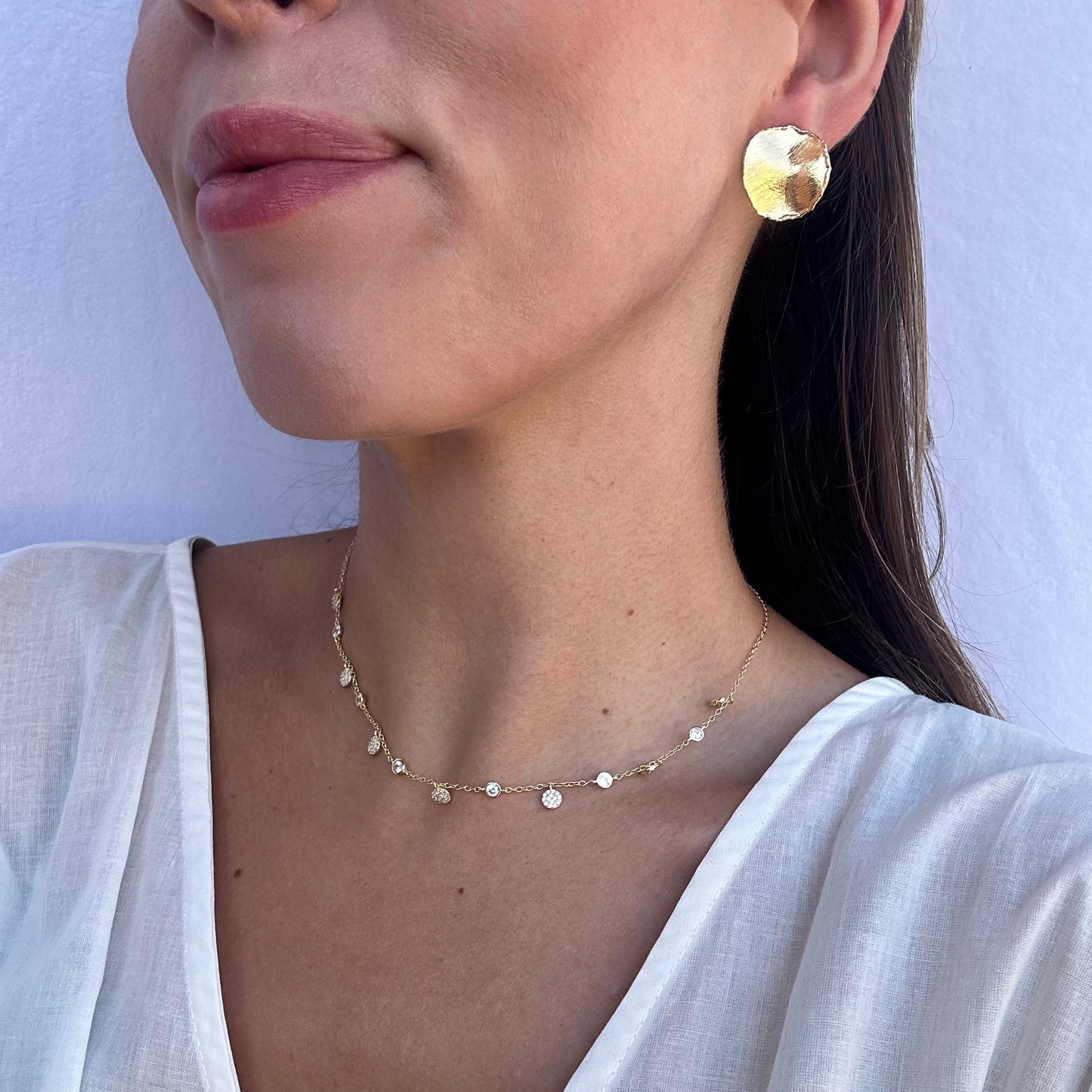 Orecchini artigianali in argento tondi design irregolare