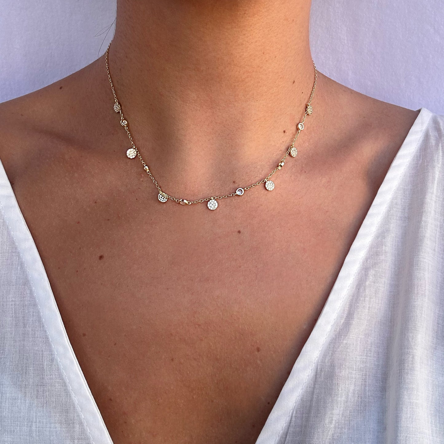 Catenina artiginale in argento con ciondoli a sfera con zirconi