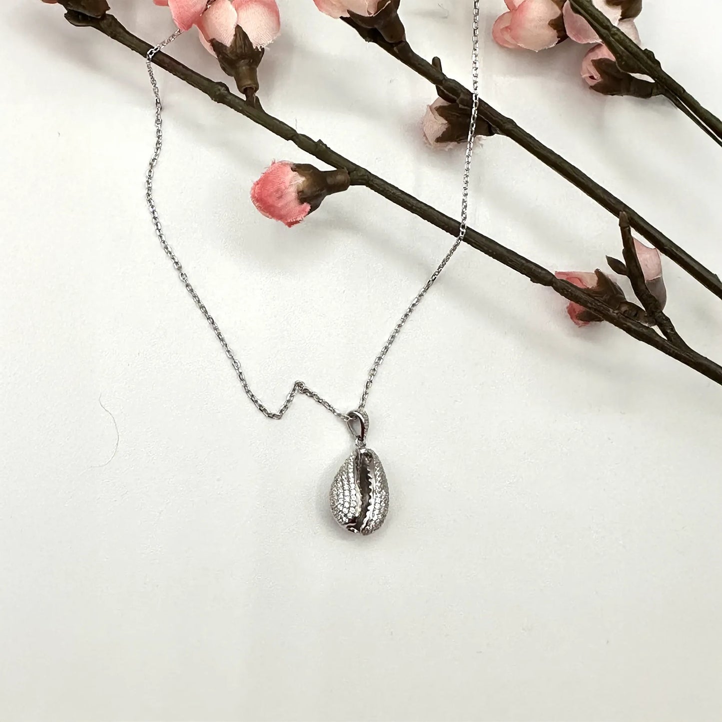 Collana con ciondolo in argento e oro rosa
