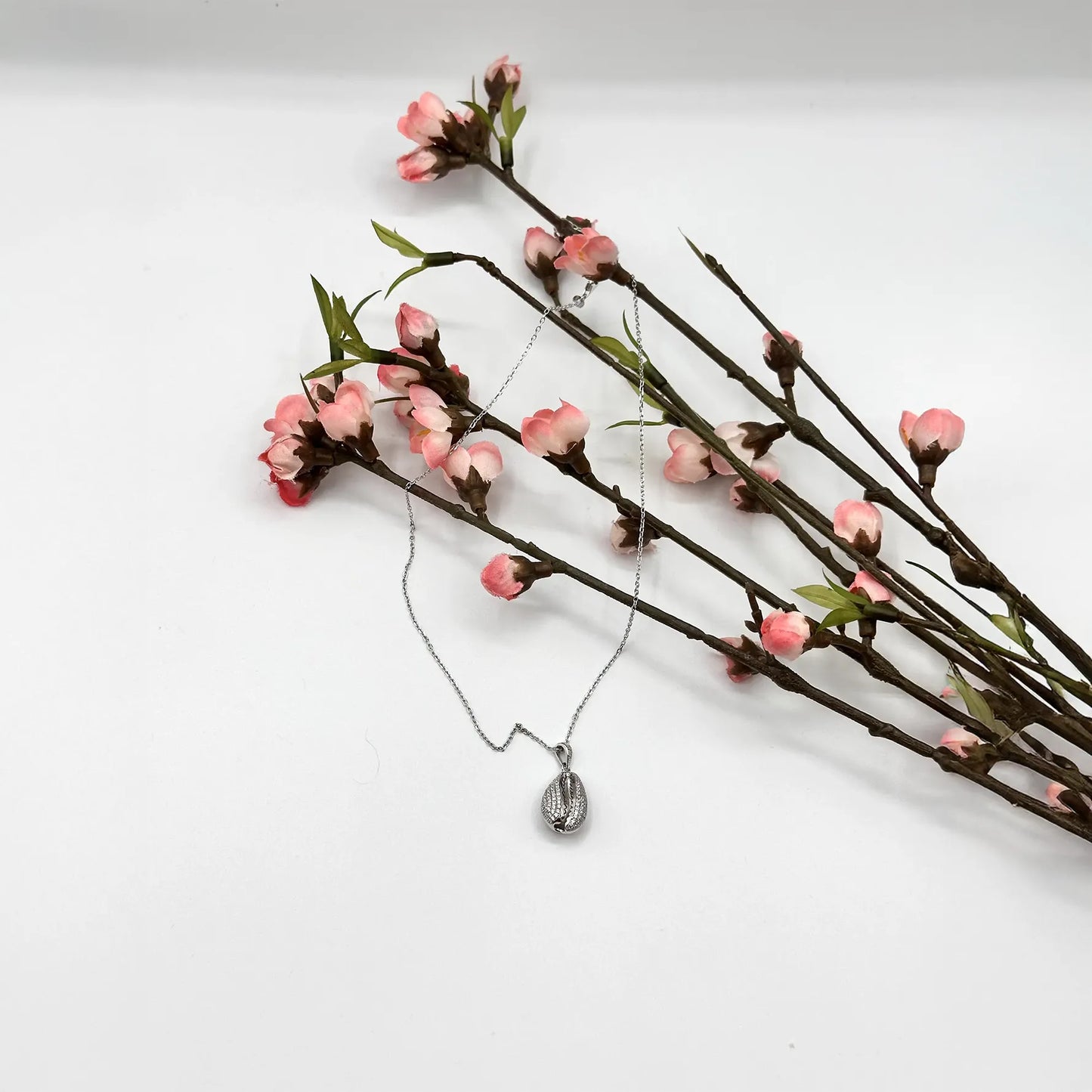 Collana con ciondolo in argento e oro rosa