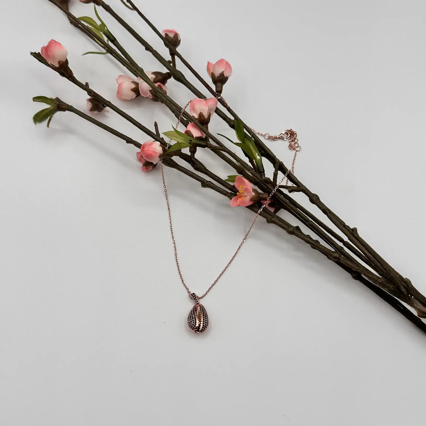 Collana con ciondolo in argento e oro rosa