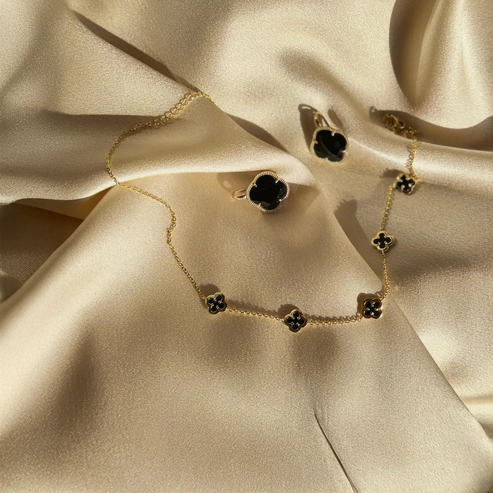 Collana a catenina con ciondoli a fiore incorniciati in argento galvanizzato oro