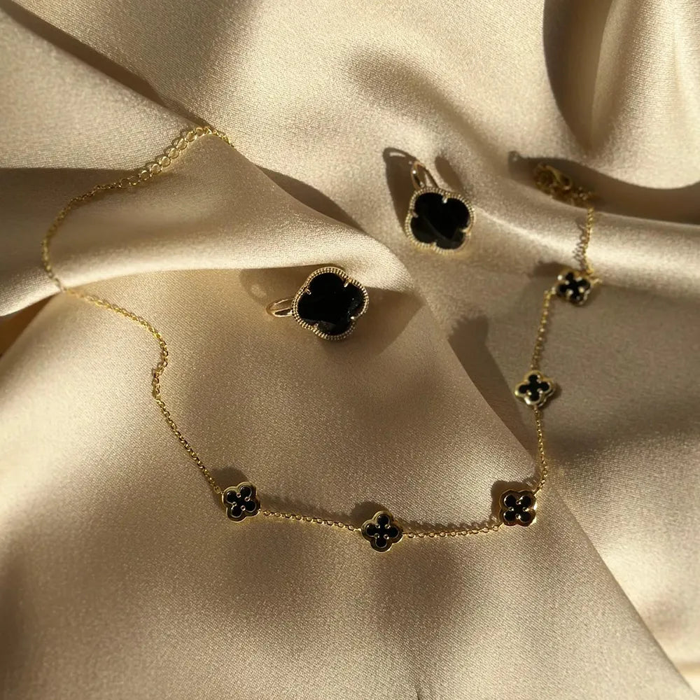 Collana a catenina con ciondoli a fiore incorniciati in argento galvanizzato oro