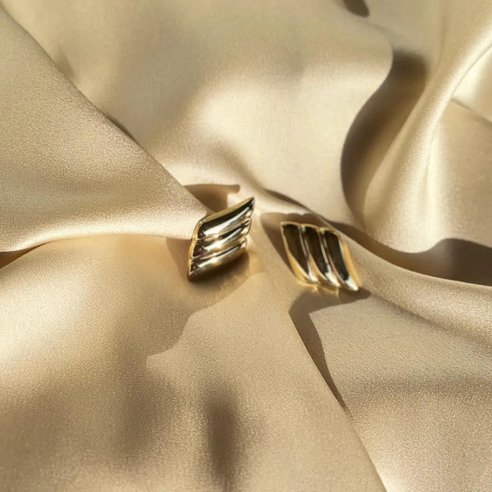 Orecchini artigianali in argento design a rombo