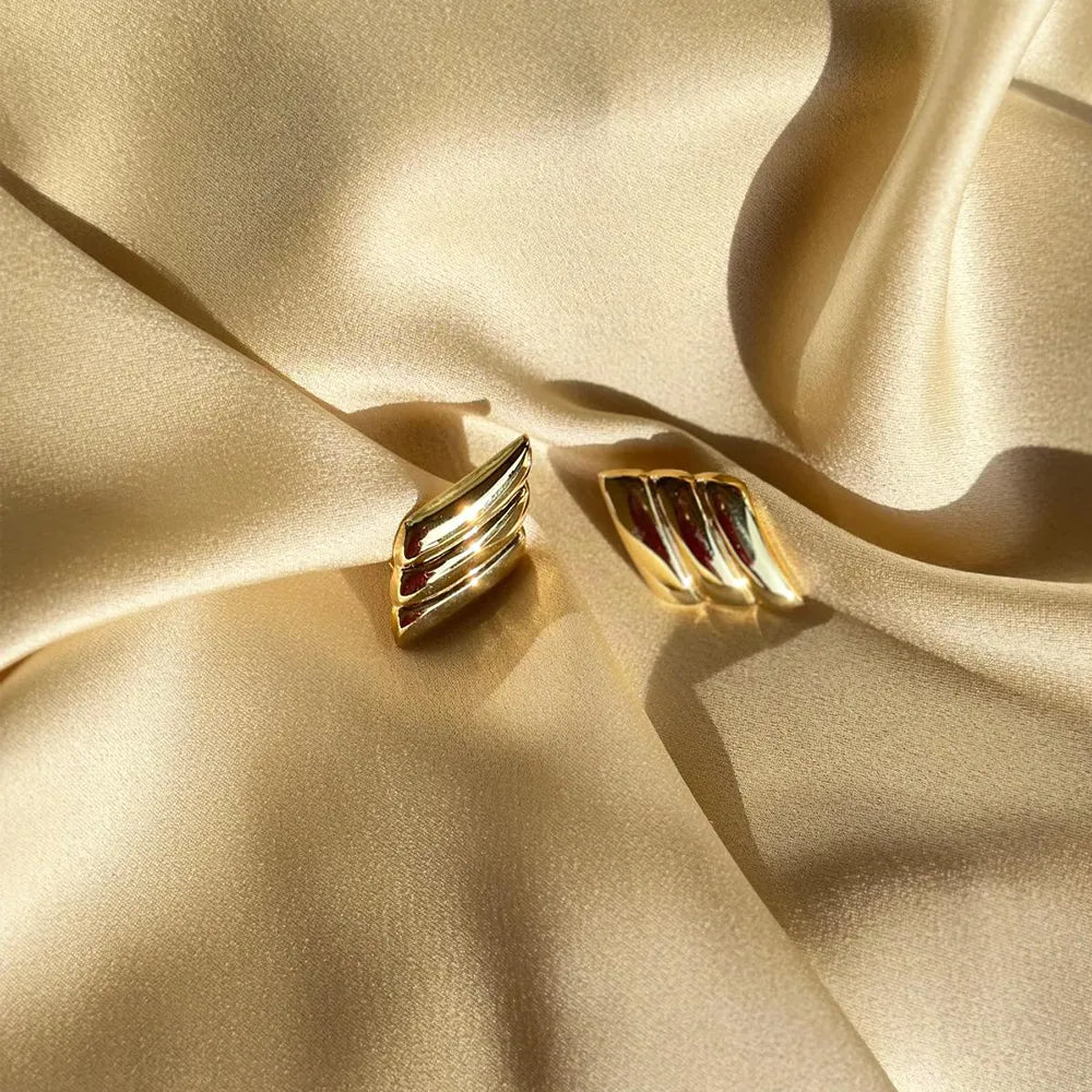 Orecchini artigianali in argento design a rombo