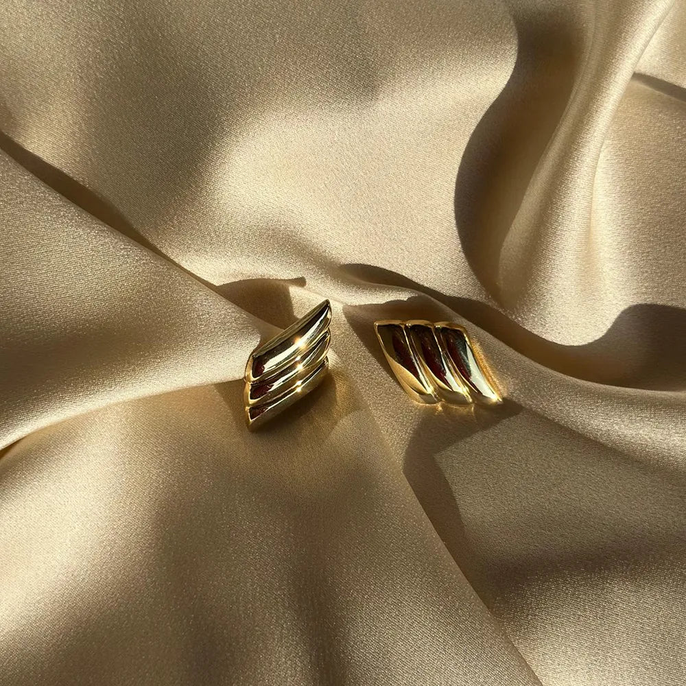 Orecchini artigianali in argento design a rombo