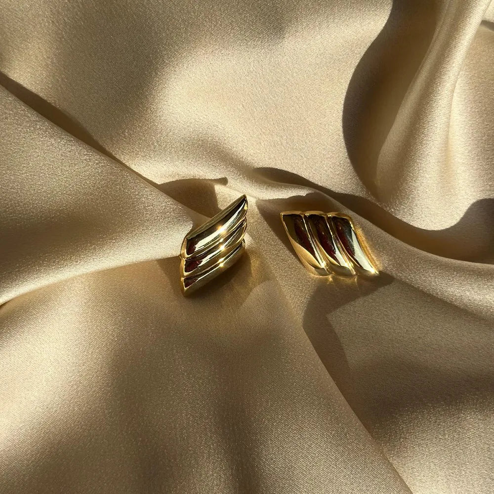 Orecchini artigianali in argento design a rombo