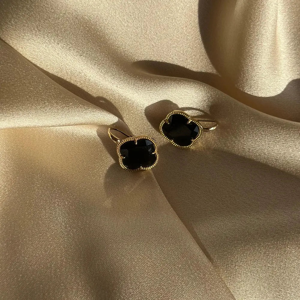 Orecchini a fiore incorniciati in argento galvanizzato oro