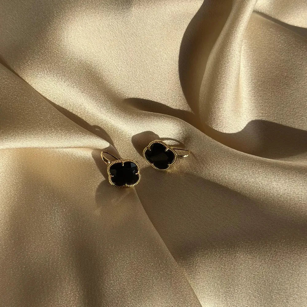 Orecchini a fiore incorniciati in argento galvanizzato oro