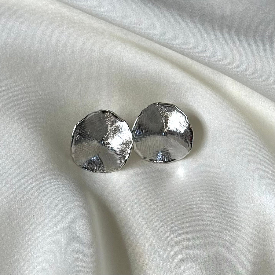 Handmade sterling silver irregular round earrings