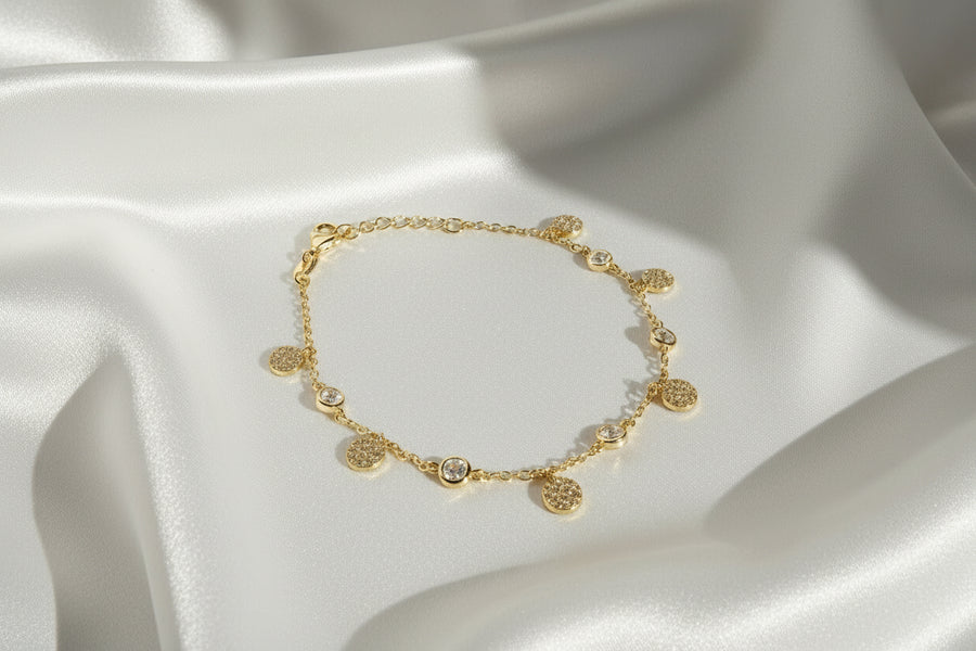 Handcrafted gold-plated silver bracelet with round cubic zirconia pendants