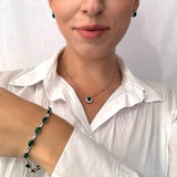 Handmade silver earrings with emerald green ruby and zircons