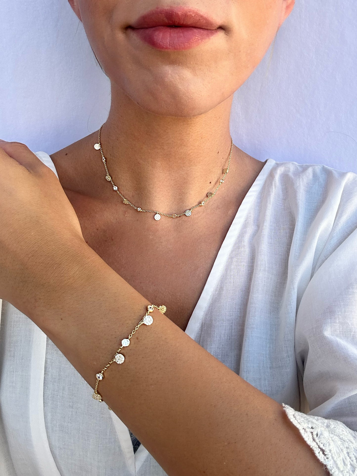 Catenina artiginale in argento con ciondoli a sfera con zirconi