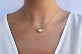 Necklace with thin silver chain and teardrop pendant